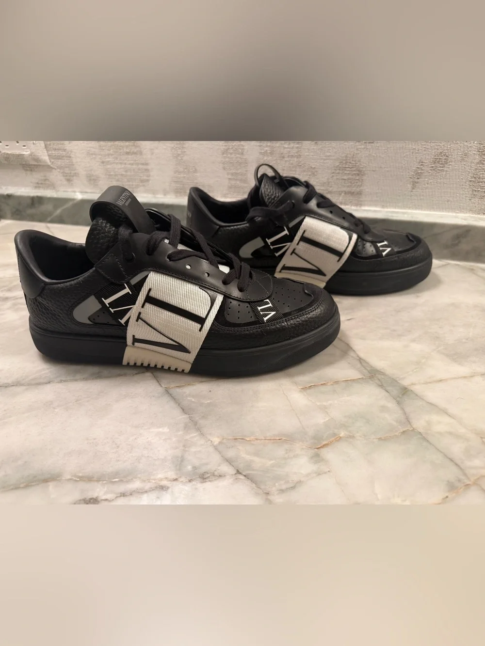 Valentino Garavani Black and White VLTN Strap Sneakers. Never worn